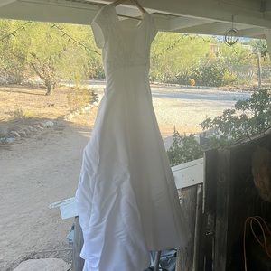 White wedding dress size twelve with bustle